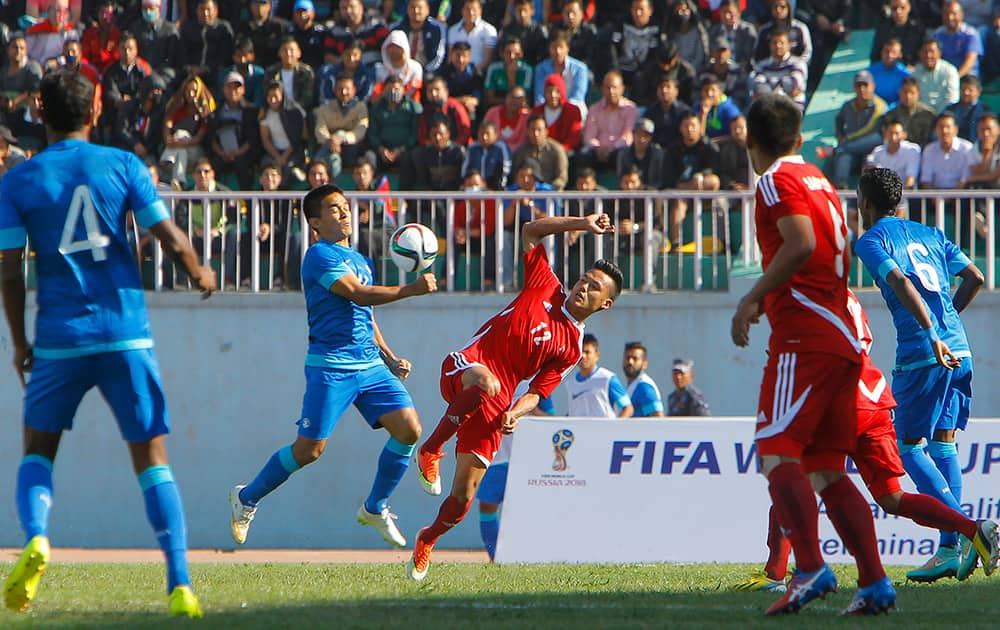 India’s Sunil Chhetri competes for the ball with Nepal’s Bikram Lama during their 2018 World Cup qualifying match in Kathmandu, Nepal.