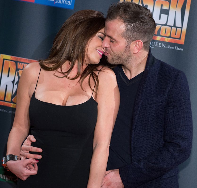 Hamburger SV soccer player Rafael van der Vaart , right, and his girlfriend Sabia Boulahrouz kiss as they arrive for the premiere of the Queen Musical 'We Will Rock You' in the Mehr! theatre in Hamburg, Germany.