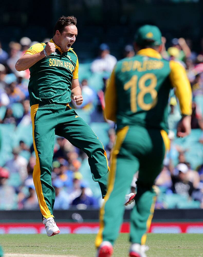 South Africa's Kyle Abbott celebrates the dismissal of Sri Lanka's Kusal Perera during their Cricket World Cup quarterfinal match in Sydney, Australia.