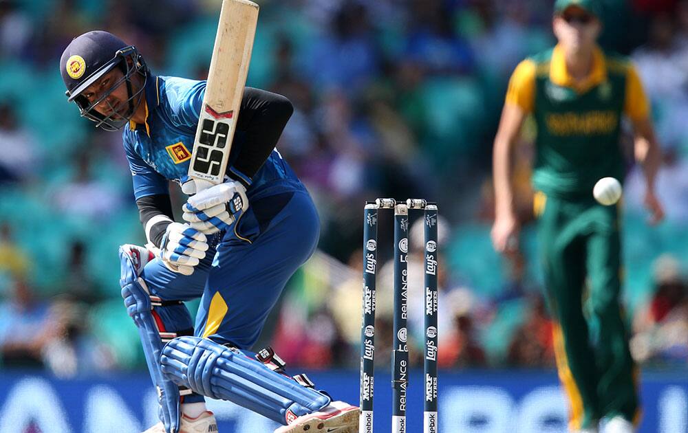 Sri Lanka's Kumar Sangakkara watches the ball pass while batting during their Cricket World Cup quarterfinal match against South Africa in Sydney, Australia.