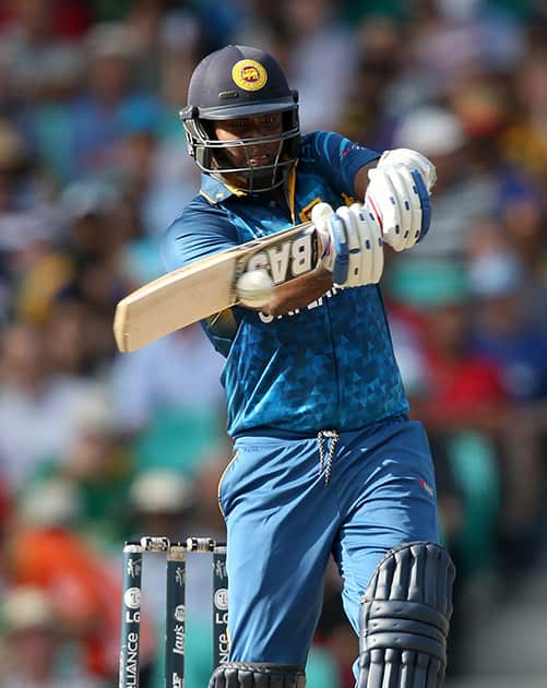 Sri Lanka's Angelo Mathews hits the ball while batting against South Africa during their Cricket World Cup quarterfinal match in Sydney, Australia