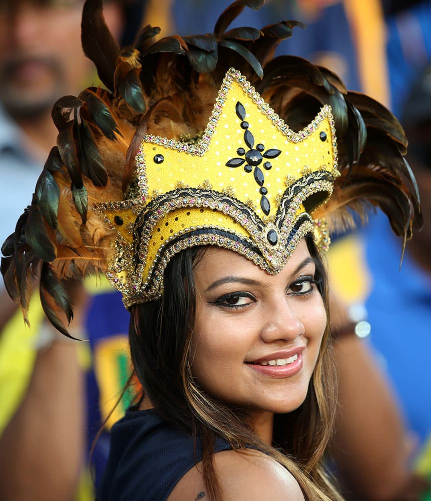 A Sri Lankan fan watches her team's Cricket World Cup quarterfinal match against South Africa in Sydney, Australia.