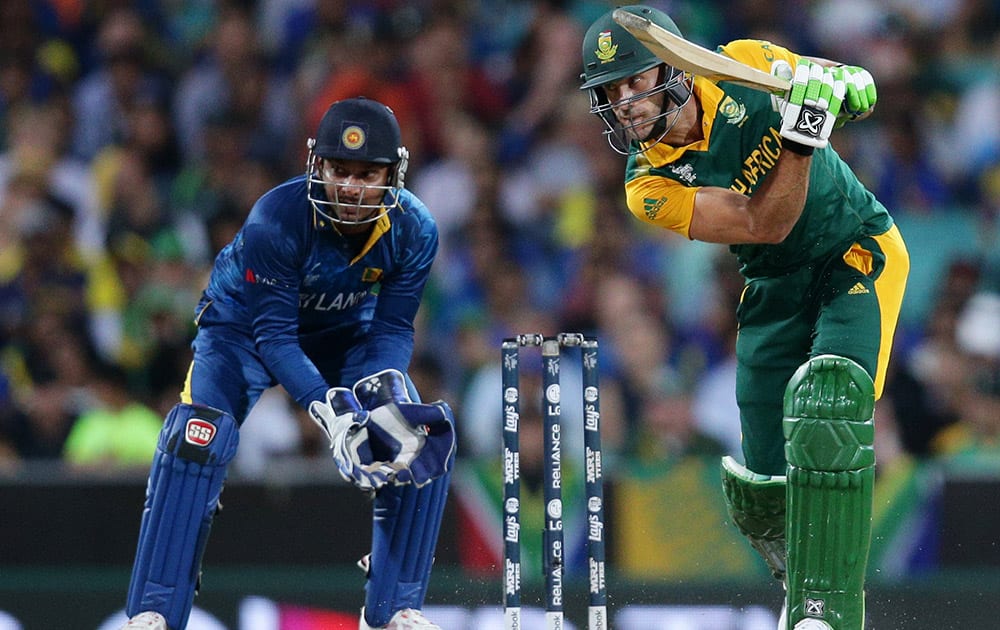 South Africa's Francois Du Plessis plays a shot as Sri Lanka's wicketkeeper Kumar Sangakkara watches during their Cricket World Cup quarterfinal match in Sydney.