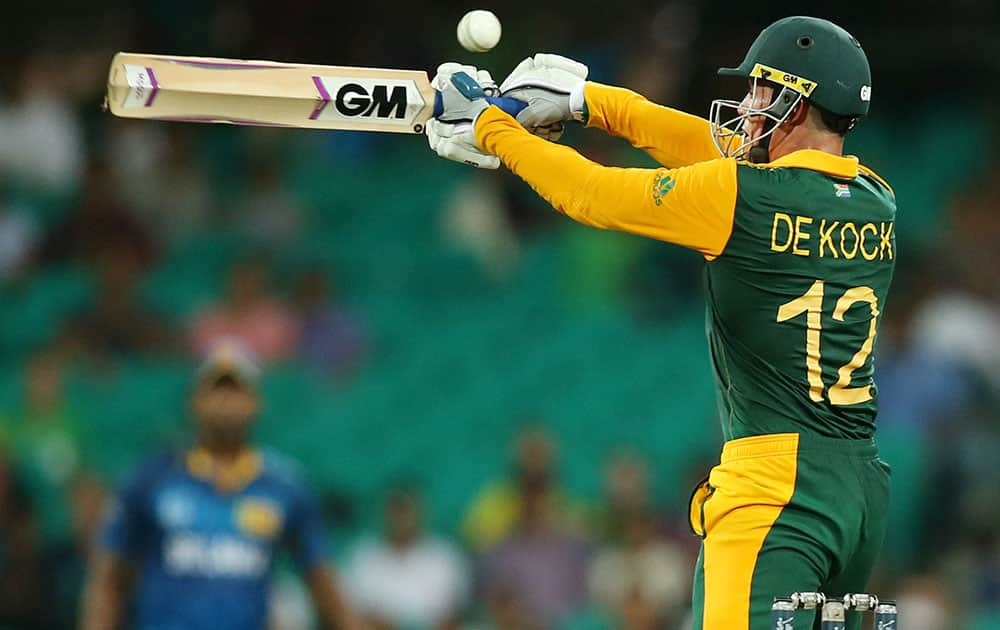 South African batsman Quinton De Kock swings at the ball during their Cricket World Cup quarterfinal match against Sri Lanka in Sydney, Australia.