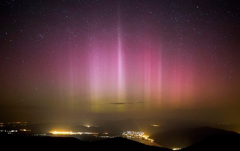 The Northern Lights are seen on the sky above Pilisszentkereszt, 26 kms north of Budapest, Hungary. Photo was taken from the viewpoint of Dobogoko in Salgotarjan.