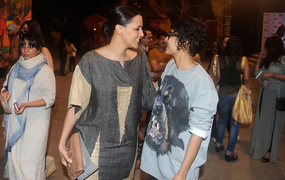 Neha Dhupia and Kiran Rao during the opening of Lakme Fashion Week Summer Resort 2015 in Mumbai. -dna