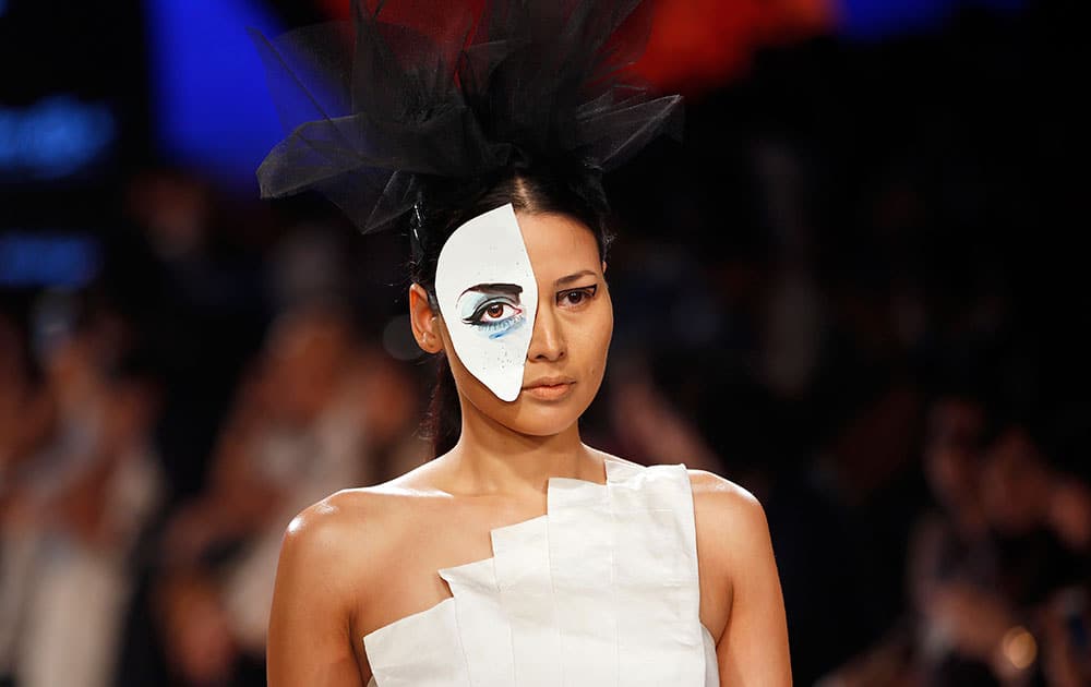 A model walks the ramp during the INIFD Gen Next Show at the Lakme Fashion Week Summer Resort 2015 in Mumbai.