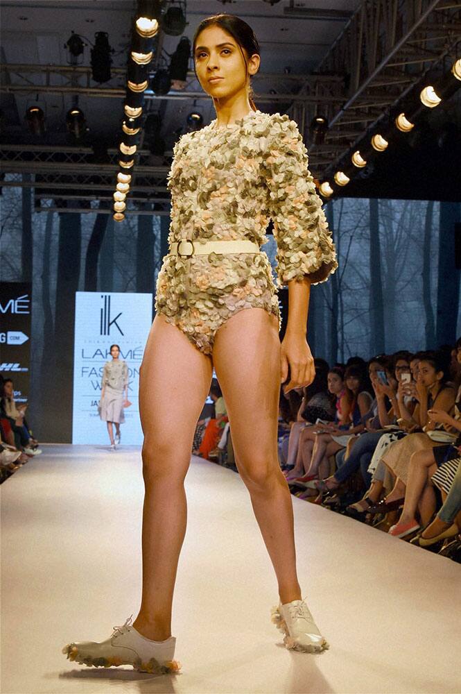 A model walks the ramp during a fashion show at the Lakme Fashion Week Summer Resort 2015 in Mumbai.