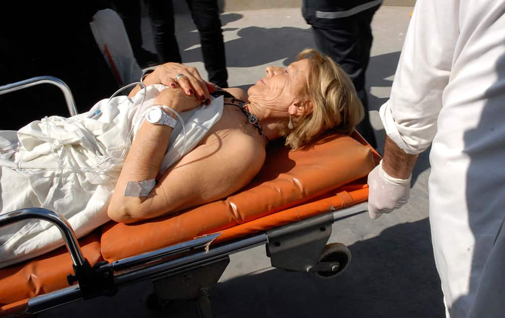 A victim arrives at the Charles Nicoles hospital after gunmen attacked the National Bardo Museum in central Tunis, Tunisia.