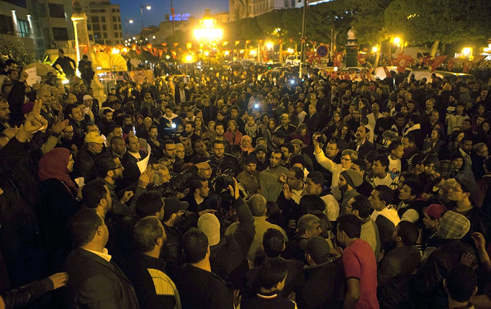 Tunisians gather at Habib Bourguiba avenue to show solidarity with the victims of the attack at a museum, Tunisia.