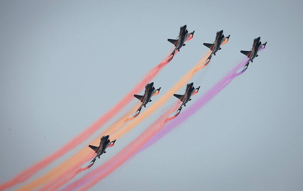 The People's Liberation Army's Air Force Air Demonstration Team, China's best-known aerobatic team, performs at Langkawi International Maritime and Aerospace Exhibition in Langkawi, Malaysia.