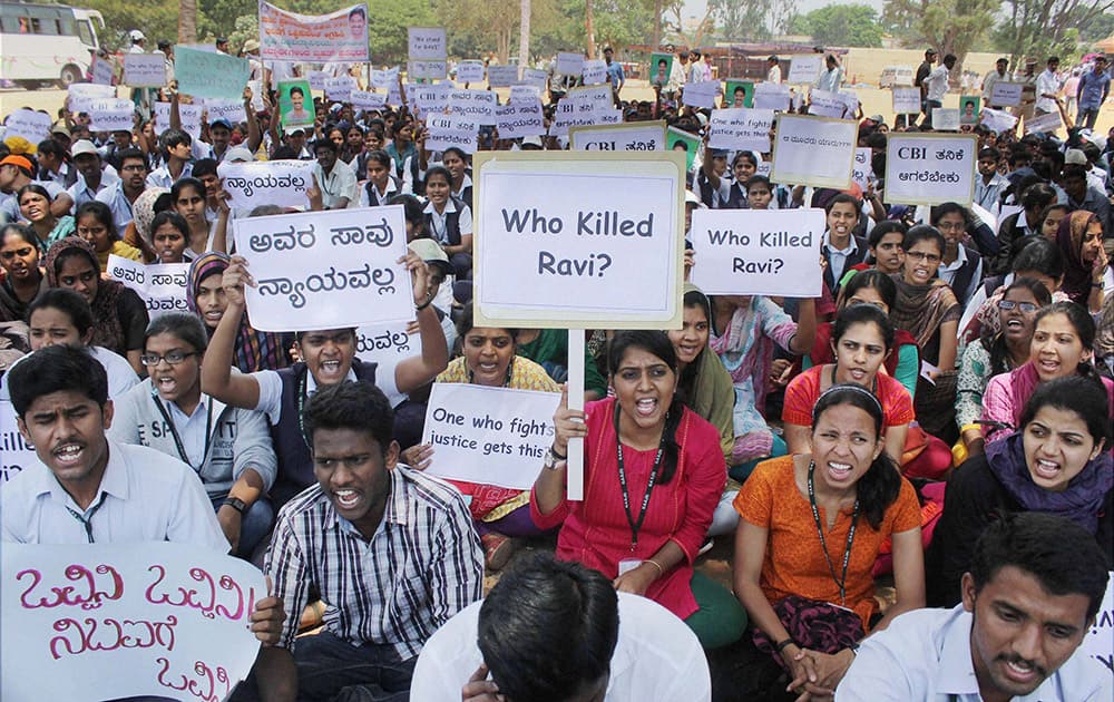 Students of various colleges shout slogans during a protest demanding CBI probe into the mysterious death of IAS officer D K Ravi in Bengaluru.