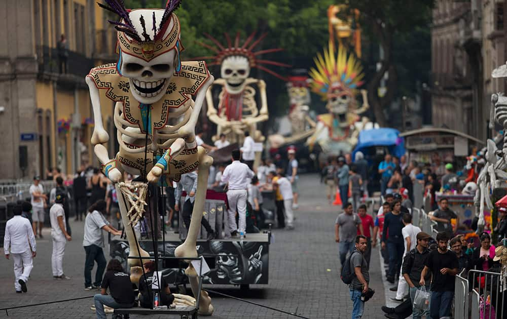 Cast members prepare for rehearsals of a scene from the James Bond film 'Spectre,' on a closed street, in the historic center of Mexico City.