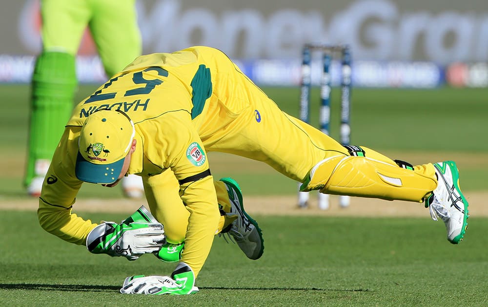 Australia's wicketkeeper Brad Haddin takes a catch to dismiss Pakistan's Sohail Khan during their Cricket World Cup quarterfinal match in Adelaide, Australia.