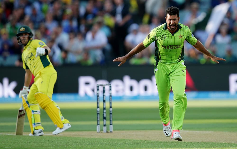 Pakistan's Sohail Khan celebrates after taking the wicket of Australia's Aaron Finch during their Cricket World Cup quarterfinal match in Adelaide, Australia.