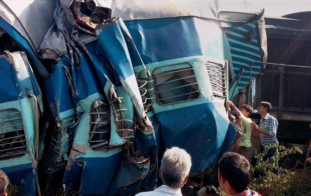 The damaged coaches after the Dehradun-Varanasi Janata Express derailed at the Bachhrawan railway station in Raebareli.