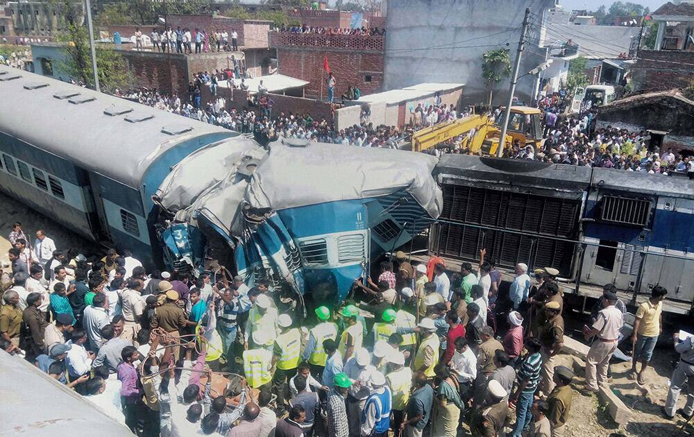 Rescue work is carried out after the Dehradun-Varanasi Janata Express derailed at the Bachhrawan railway station in Raebareli.