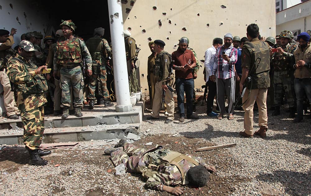 The body of a militant lies on the ground at Rajbagh police station in Kathua district, about 80 kilometers (50 miles) south of Jammu.