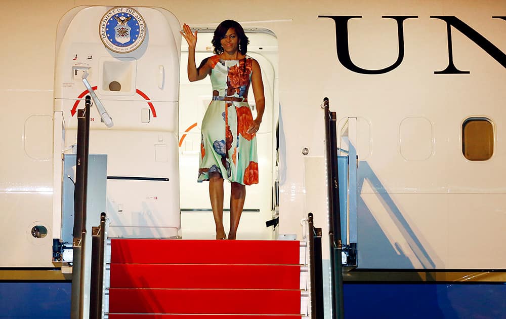 US first lady Michelle Obama arrives at Siem Reap International Airport, in Siem Reap, Cambodia. Mrs. Obama's Friday evening arrival in Cambodia comes after a three-day visit to Japan.