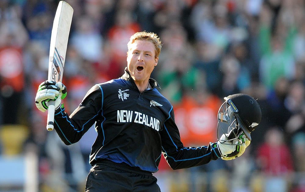 New Zealand’s Martin Guptill celebrates after scoring a double century while batting against the West Indies during their Cricket World Cup quarterfinal match in Wellington.