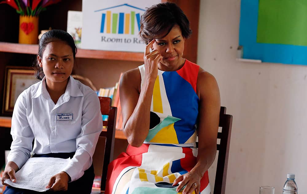 US first lady Michelle Obama gives advice to high school students after listening to their personal stories and aspirations, on the outskirts of Siem Reap, Cambodia.