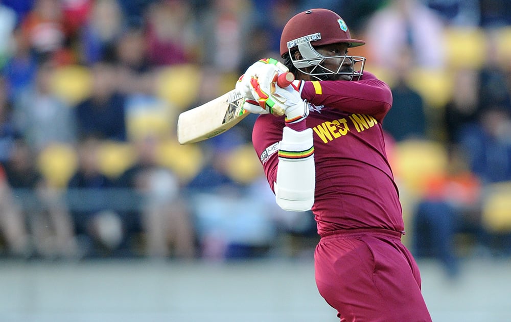 West Indies batsman Chris Gayle plays a shot while batting against New Zealand during their Cricket World Cup quarterfinal match in Wellington, New Zealand.