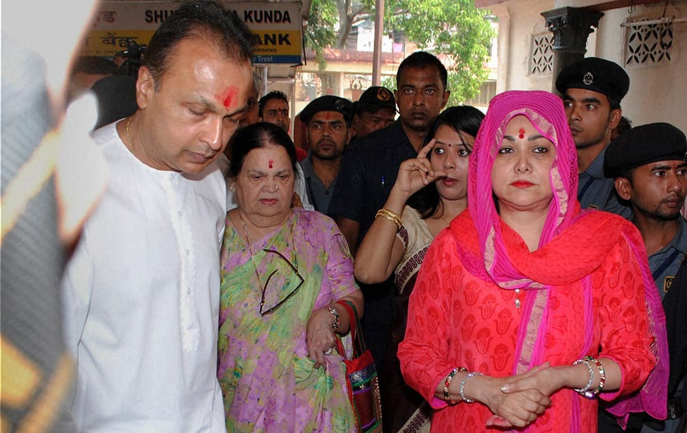  Industrialist Anil Ambani with his mother Kokilaben and wife Tina at Kamakhya Temple in Guwahati during the first day of the Navaratri.