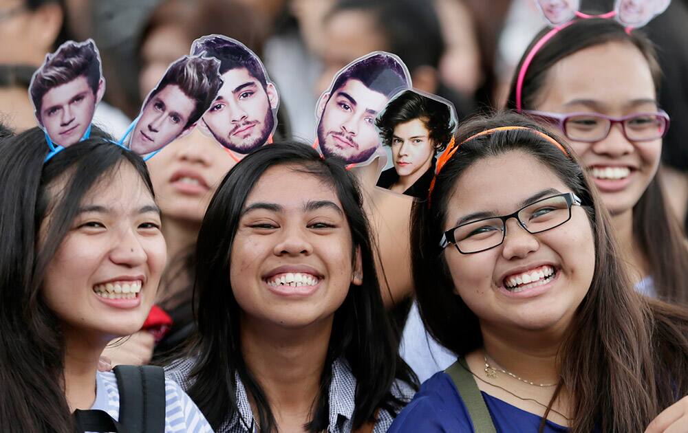 Filipino fans line up for the One Direction concert in the suburban Pasay city south of Manila, Philippines. One Direction's 