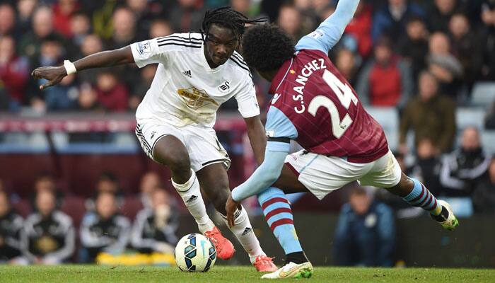 Swansea&#039;s Bafetimbi Gomis strikes late to keep Aston Villa in relegation trouble