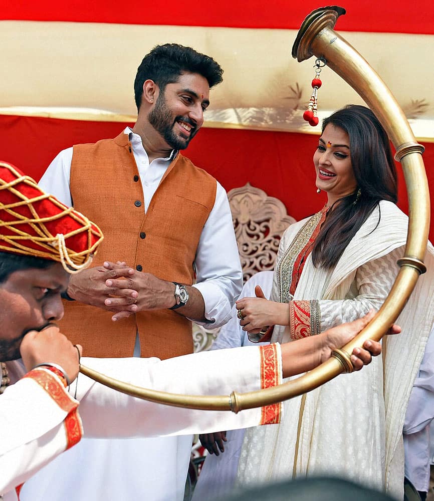 Bollywood actor Abhishek Bachchan and Aishwarya Rai Bachchan take part in a Gudi Padwa celebrations in Mumbai.