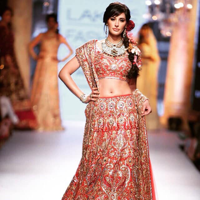 VOGUE India :- The stunning @NargisFakhri closes the show for @SuneetvDesign ​ at @LakmeFashionWk!  -twitter