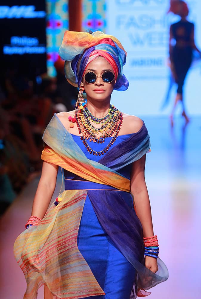 A model displays creations by Tarun Tahiliani during the Lakme Fashion Week Summer Resort 2015 in Mumbai.