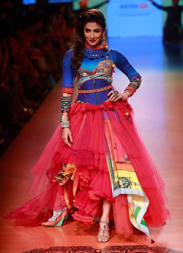 Bollywood actress Chitrangada Singh walks the ramp in designer Tarun Tahilianis creation during the Lakme Fashion Week Summer Resort-2015, in Mumbai.