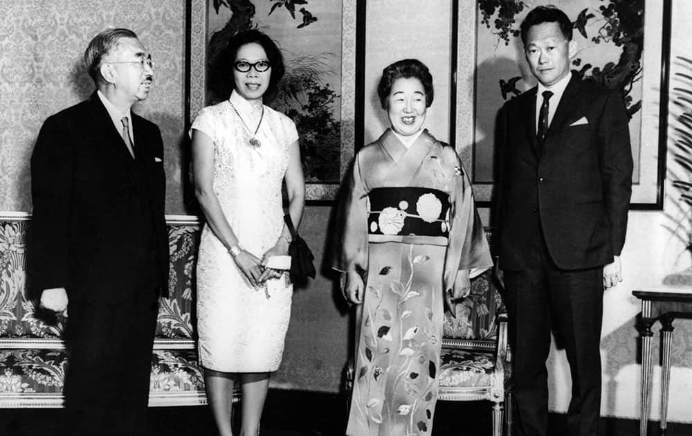 FILE - In this Oct. 15, 1968, file photo, Singapore's then Prime Minister Lee Kuan Yew, right, and his wife Kwa Geok Choo, second left, pose with the Japanese Emperor Hirohito and his wife Empress Nagako, in the Imperial Palace, in Tokyo, Japan.
