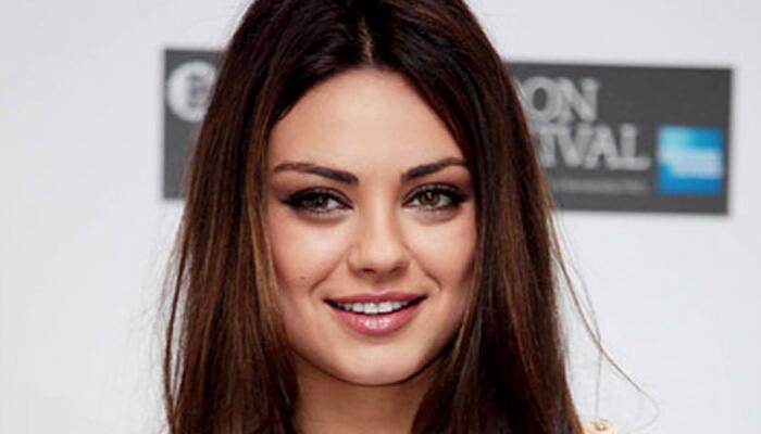 Mila Kunis is Mrs. Kutcher!