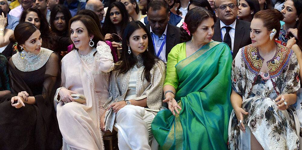 Industrialist Mukesh Ambanis wife Neeta Ambani and daughter Esha Ambani along with actresses Deepika Padukone, Shabana Azmi and Sonakshi Sinha during Lakme Fashion Week SummerResort 2015, in Mumbai.