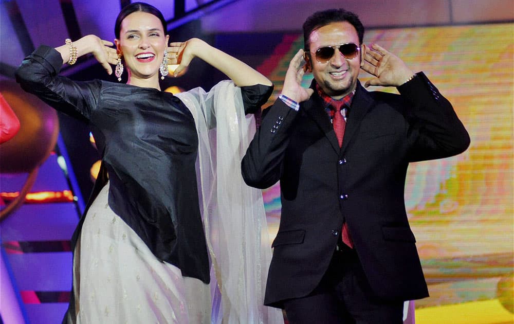 Bollywood actors Neha Dhupia and Gulshan Grover performs during Prag Cine Awards in Dibrugarh.