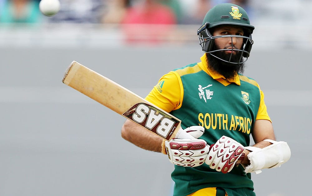 South Africa's Hashim Amla lets a ball pass while batting against New Zealand during their Cricket World Cup semifinal in Auckland, New Zealand.