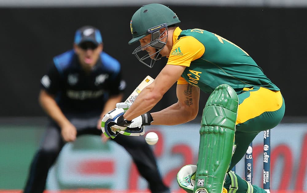 South Africa's Francois Du Plessis let's a ball pass while batting against New Zealand during their Cricket World Cup semifinal in Auckland, New Zealand.