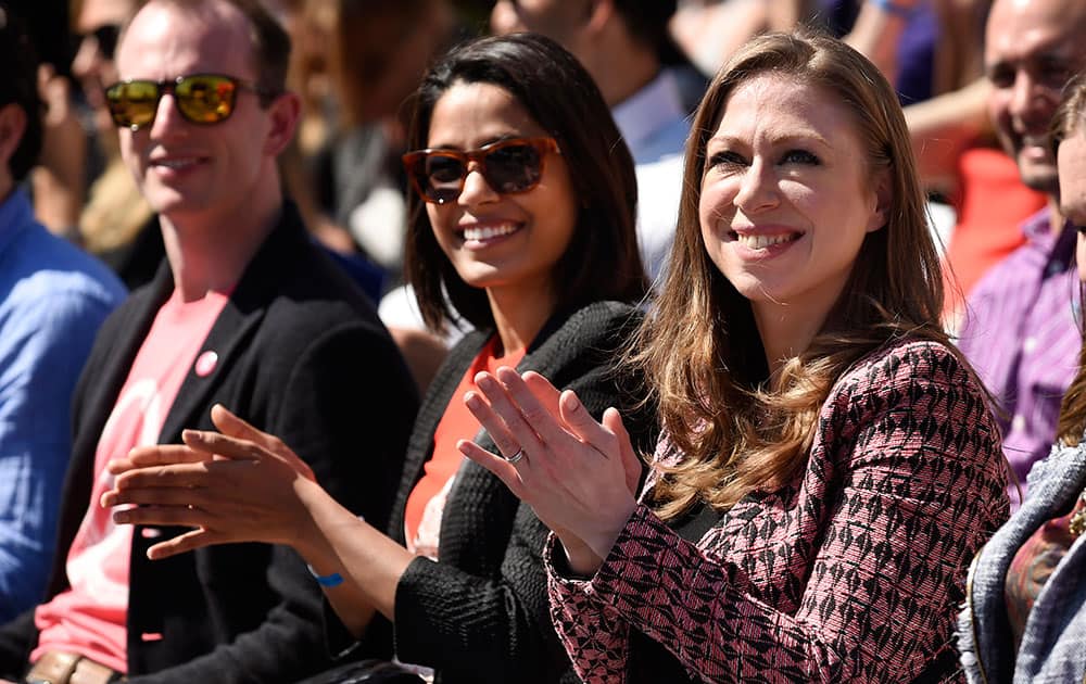 Chelsea Clinton, vice chair of the Clinton Foundation, and actress Freida Pinto applaud at the launch of ServiceNation's 