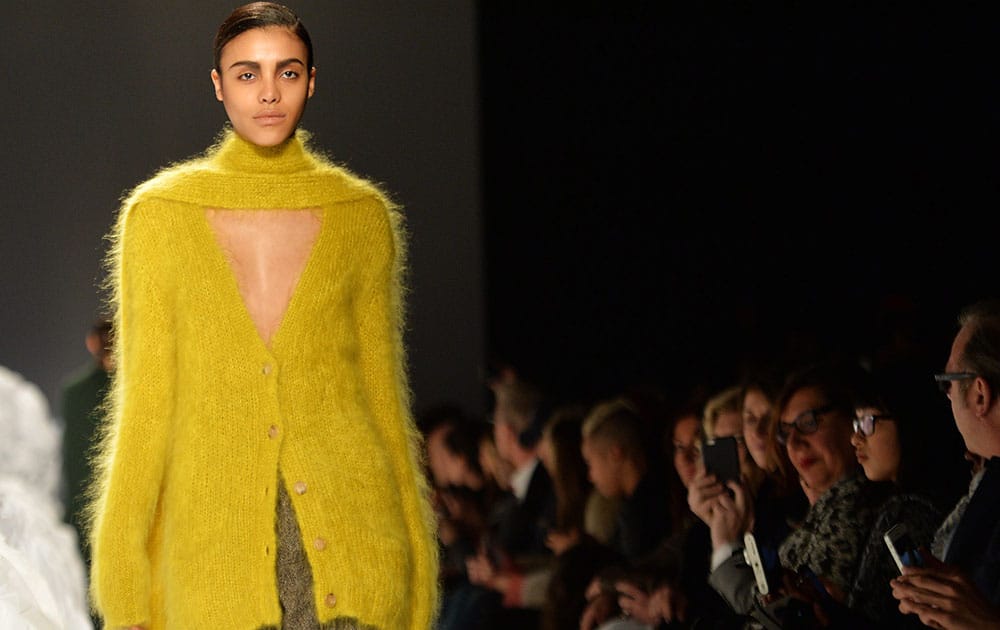 A model walks the runway for the Pink Tartan Fall 2015 collection during Toronto fashion week.