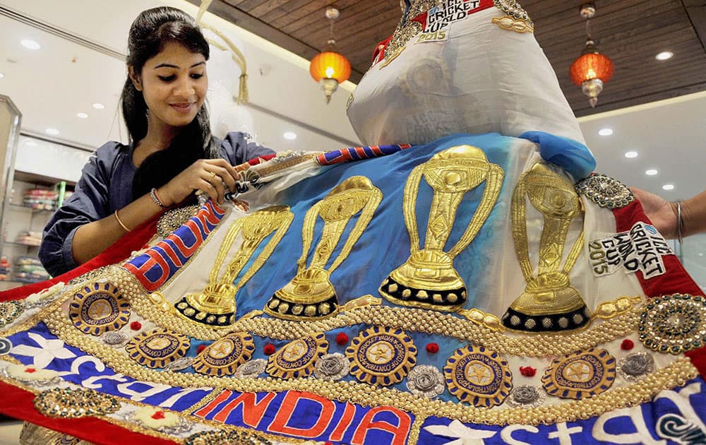 A saree trader with two specially made sarees of 65 thousand rupees each, to be gifted to team India captain Mahendra Singh Dhoni, after winning the World Cup.