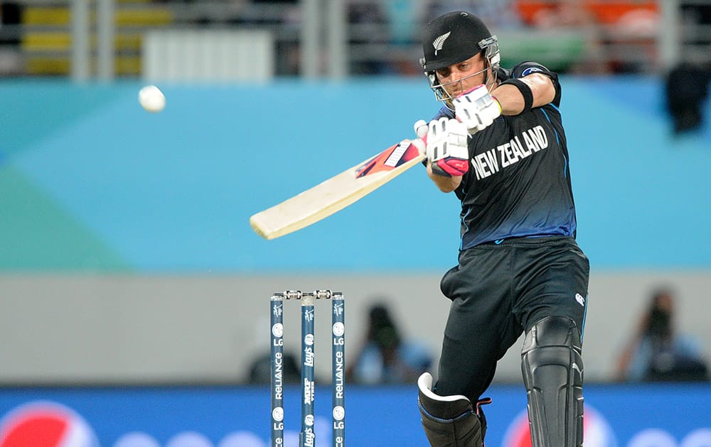 New Zealand’s Brendon McCullum hits the ball for six runs while batting against South Africa during their Cricket World Cup semifinal in Auckland, New Zealand.