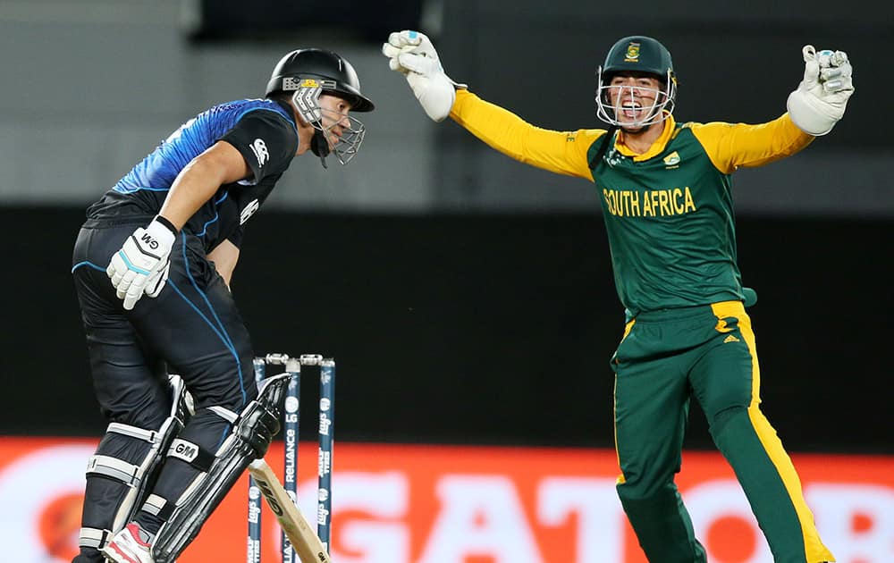 South African wicketkeeper Quinton De Kock celebrates after dismissing New Zealand’s Ross Taylor, during their Cricket World Cup semifinal in Auckland, New Zealand.