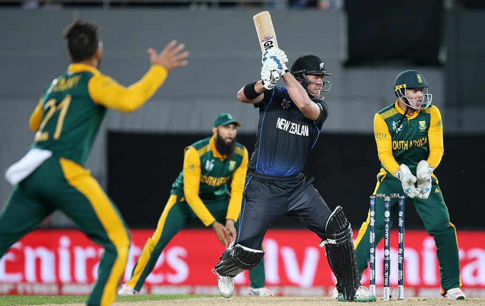 New Zealand’s Corey Anderson plays a shot while batting against South Africa during their Cricket World Cup semifinal in Auckland.