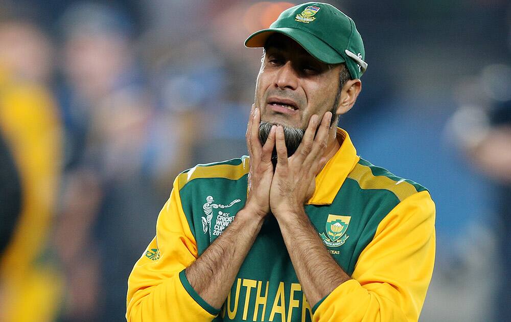 South Africa's Imran Tahir reacts after his team's four wicket loss to New Zealand in their Cricket World Cup semifinal in Auckland, New Zealand.