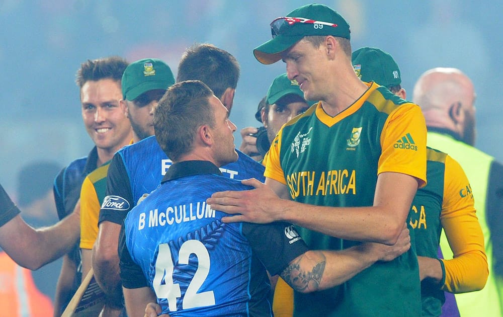 New Zealand’s Brendon McCullum embraces South Africa's Morne Morkel after their Cricket World Cup semifinal in Auckland, New Zealand. New Zealand defeated South Africa by four wickets.