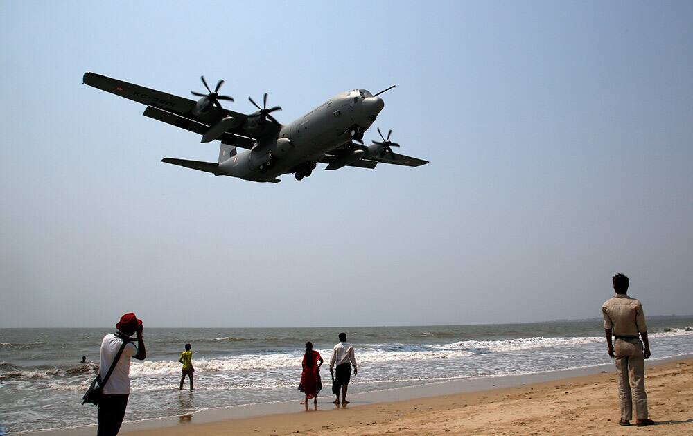 Indian Air Force's Hercules C-130J, prepares to land at the Juhu strip on the Arabian Sea coast as part of a terror preparedness exercise in Mumbai.