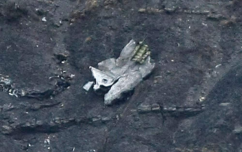 Debris of the crashed Germanwings passenger jet is scattered on the mountain side near Seyne les Alpes, French Alps.