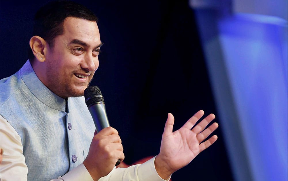 Bollywood actor Amir Khan speaks during the inaugural session of FICCI Frames 2015 in Mumbai.